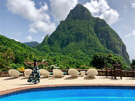 Stonefield resort - The resort boasts one of the most dramatic settings in the Caribbean, dwarfed by the Petit Piton, the 2400 ft incisor-shaped spike that soars from the water just south of Soufriere. Stonefield is set on 27 acres of steep hillside, a swathe of a thousand greens. Gulleys exploding with tropical flora run down through the estate.